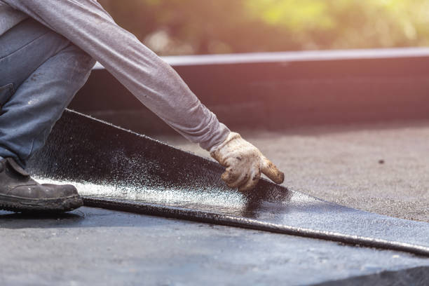 Professional Basement Waterproofing technician working in Cedarville, NJ
